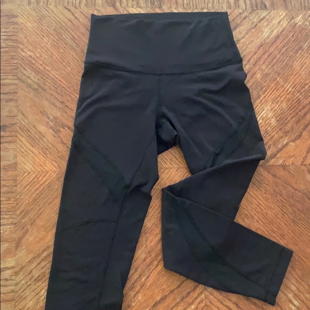Lululemon black size 4 leggings with mesh stripe